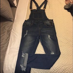 Small stretchy distressed jean overalls
